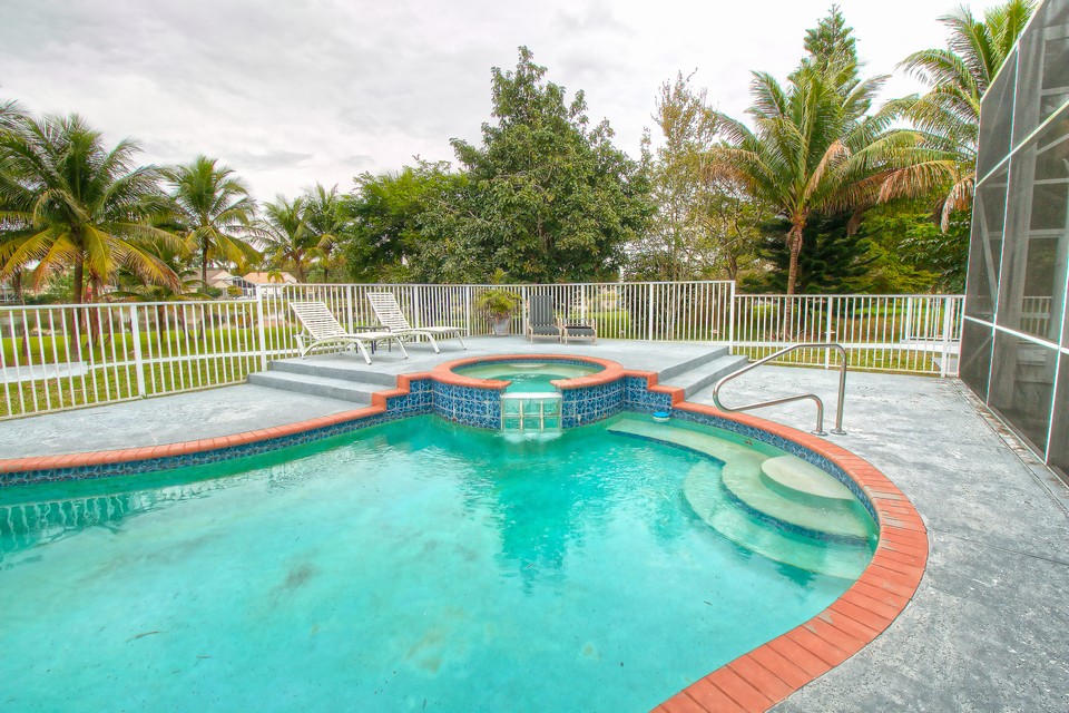 the heated freeform pool & raised spa with waterfall will be perfect for weekends at home.