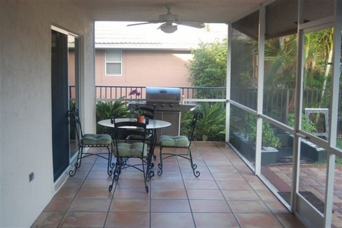 screened patio the huge screened patio has plenty of room for a table and chairs, as well as loinge chairs and a barbecue.