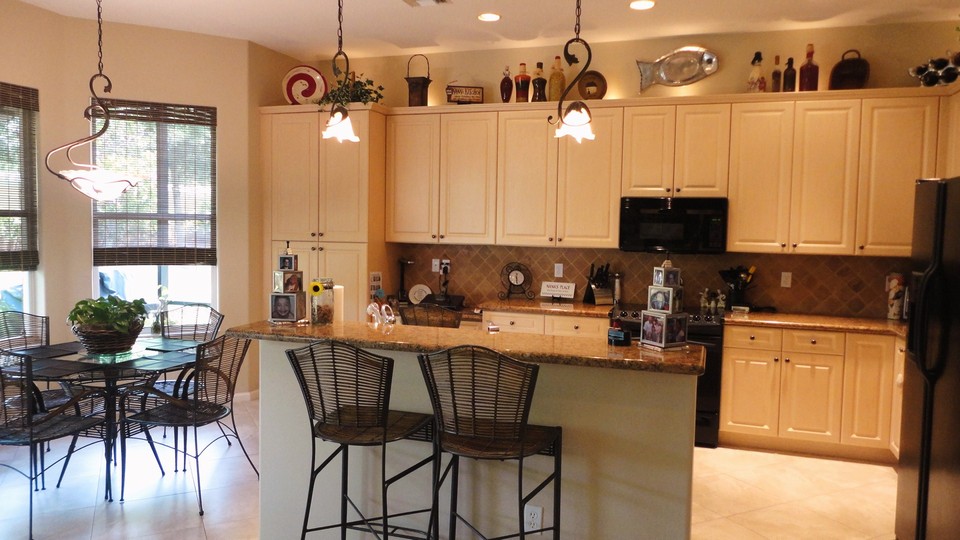 kitchen the kitchen is beautiful and includes granite counters with tumblestone backsplash, 42 custom cabinetry & more.