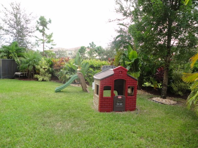 backyard the private & lushly landscaped backyard has room for a pool,