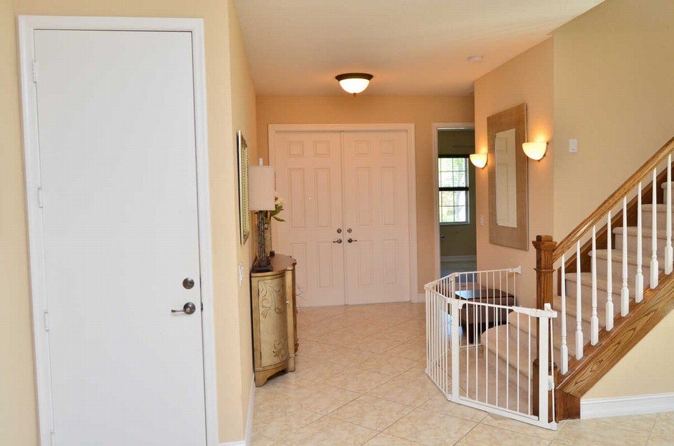 foyer the double door entry leads you to the dramatic foyer that flows into the open floorplan.