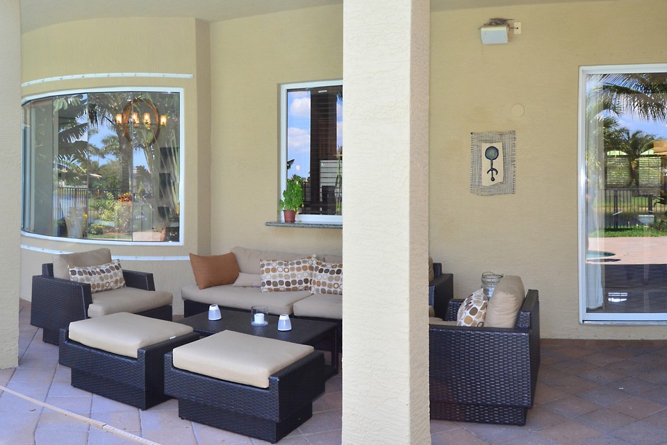 covered patio your tropical oasis starts with a covered patio that runs the entire length of the first floor.