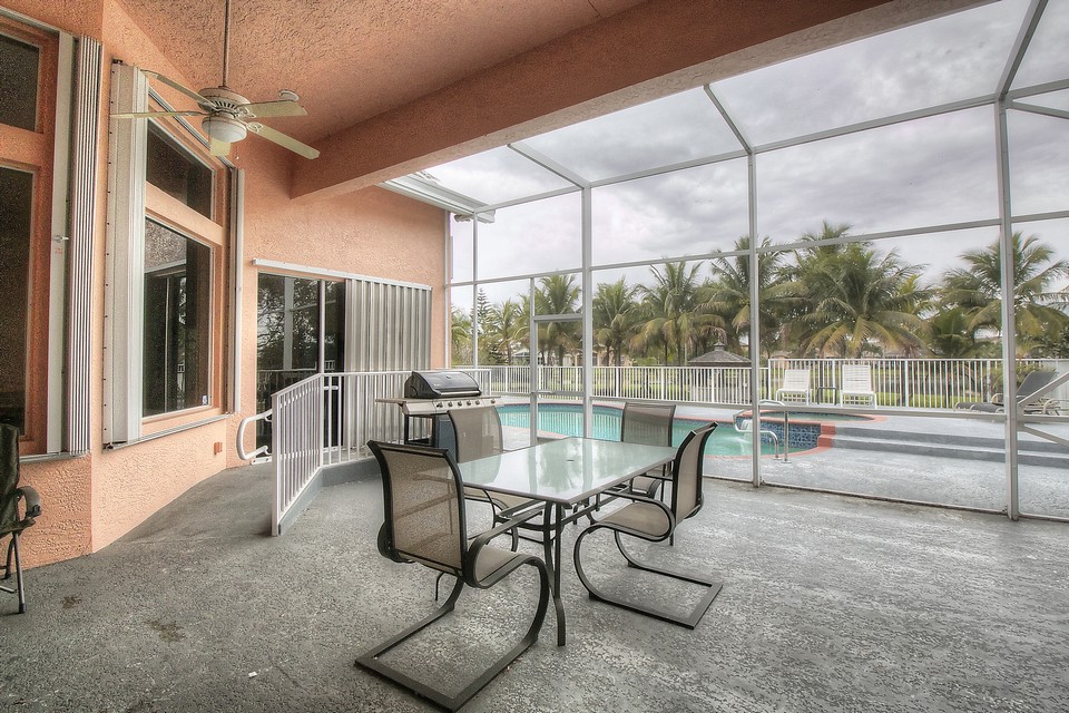 the extended screened patio is perfect for family bbq's!