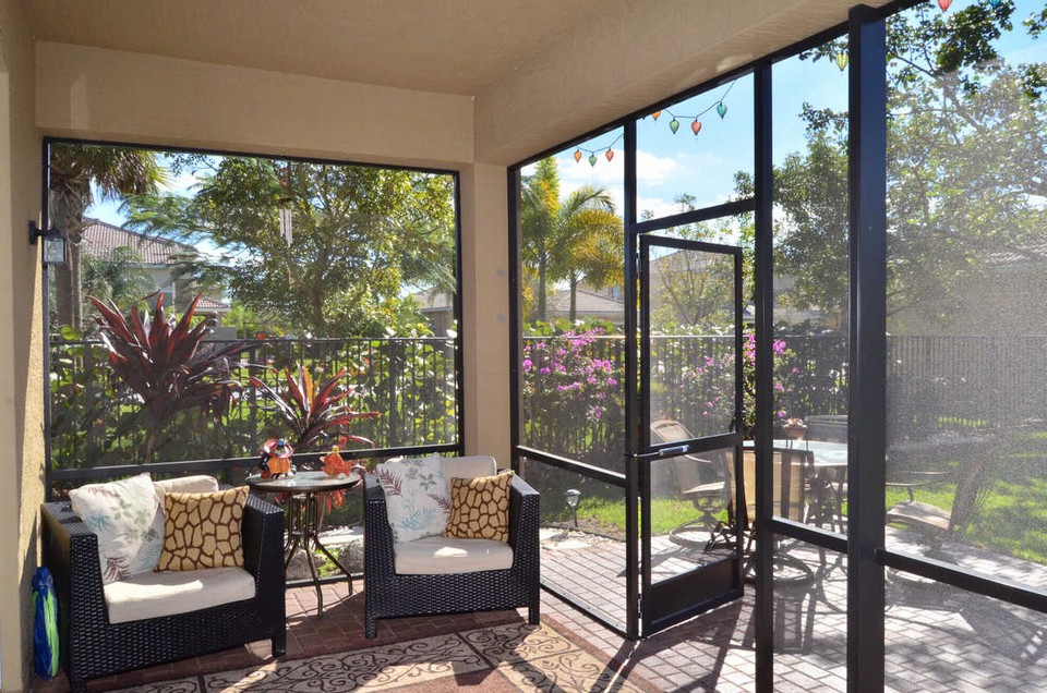 screened patio the screened in patio is a perfect location to take in the tranquil backyard.