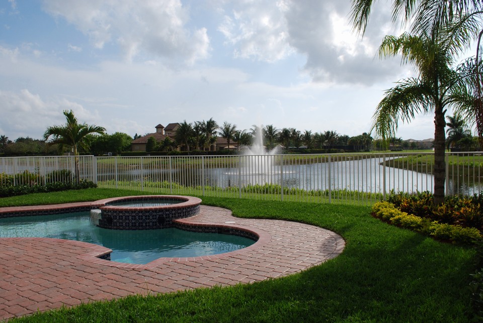 pool area this beautiful heated pool wiuth spa has dramatic lake views and is completely fenced in.